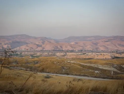 Settlers chasing shepherds in the northern Jordan Valley