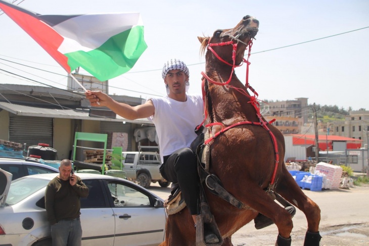 Horses march in Umm al-Fahm to commemorate Earth Day