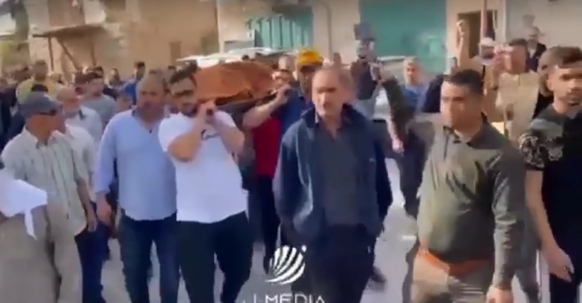 Bethlehem fans mourn the body of the martyr Ghada Sabatien