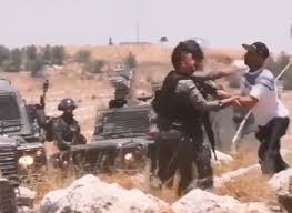 Video- An unarmed Palestinian confronts three Israeli soldiers in Tarqumiya