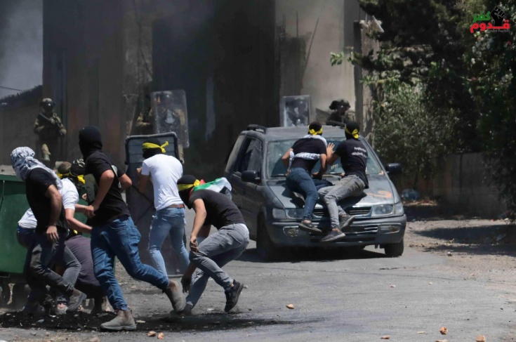 5 injured by the occupation bullets during the suppression of the Kafr Qaddoum march