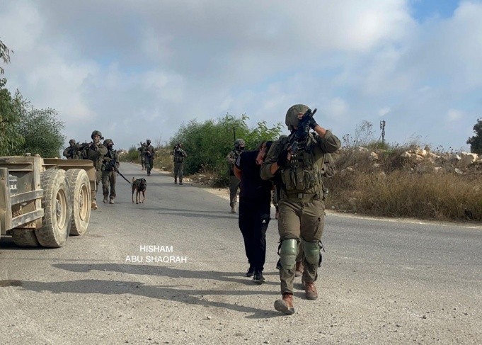 The occupation targets a building in the Jalazun camp