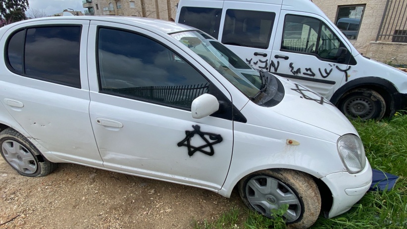 Racist slogans and vandalizing vehicle tires in the neighborhood of Sheikh Jarrah
