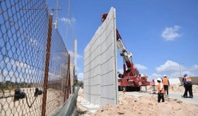 The occupation begins building a section of the wall on the lands of Al-Jalama